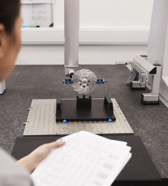female-engineer-uses-cmm-coordinate-measuring-mach-2024-10-19-02-38-21-utc-min